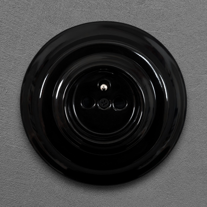 Single black French porcelain socket, flush-mount, front