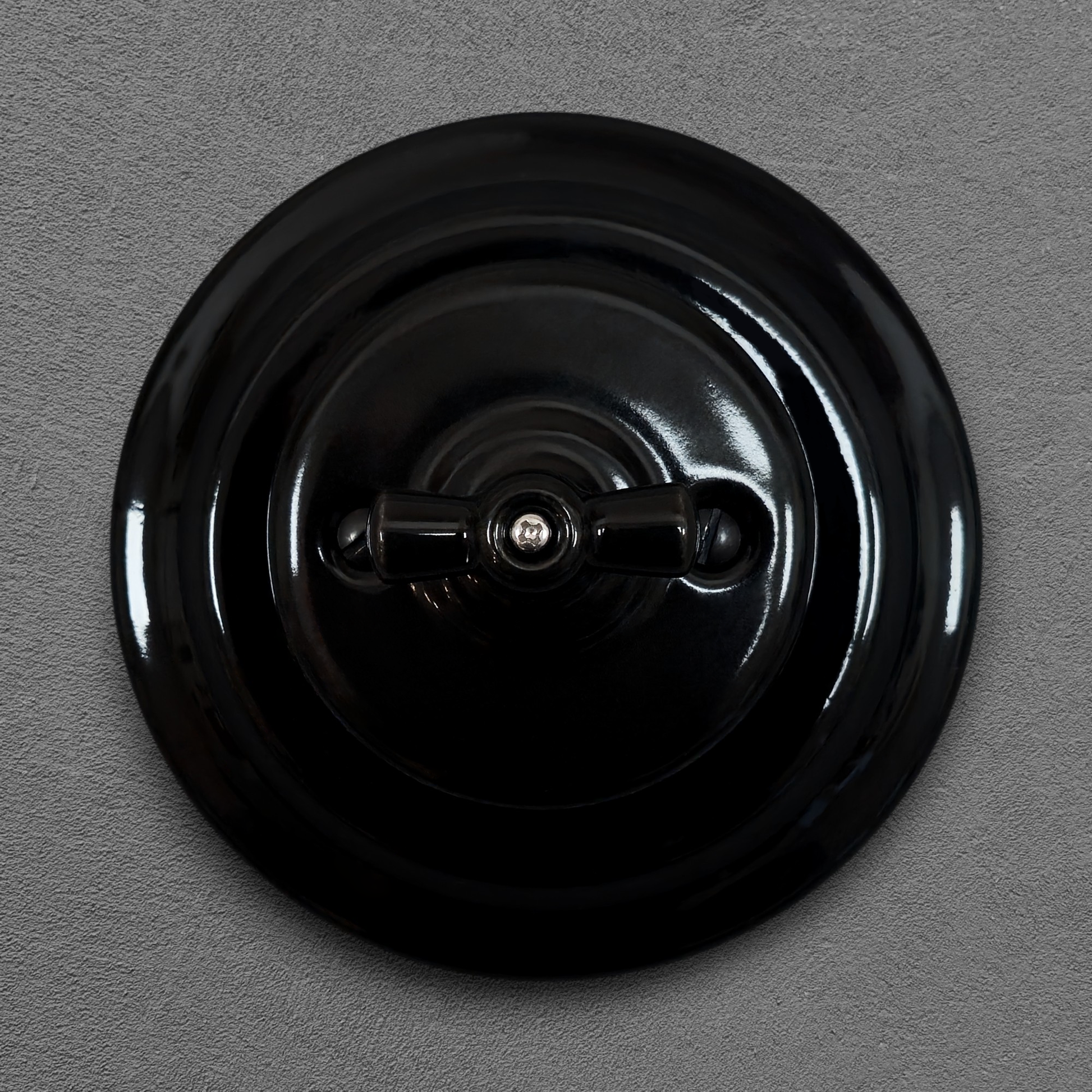 black porcelain double1way rotary switch, flush-mount, front