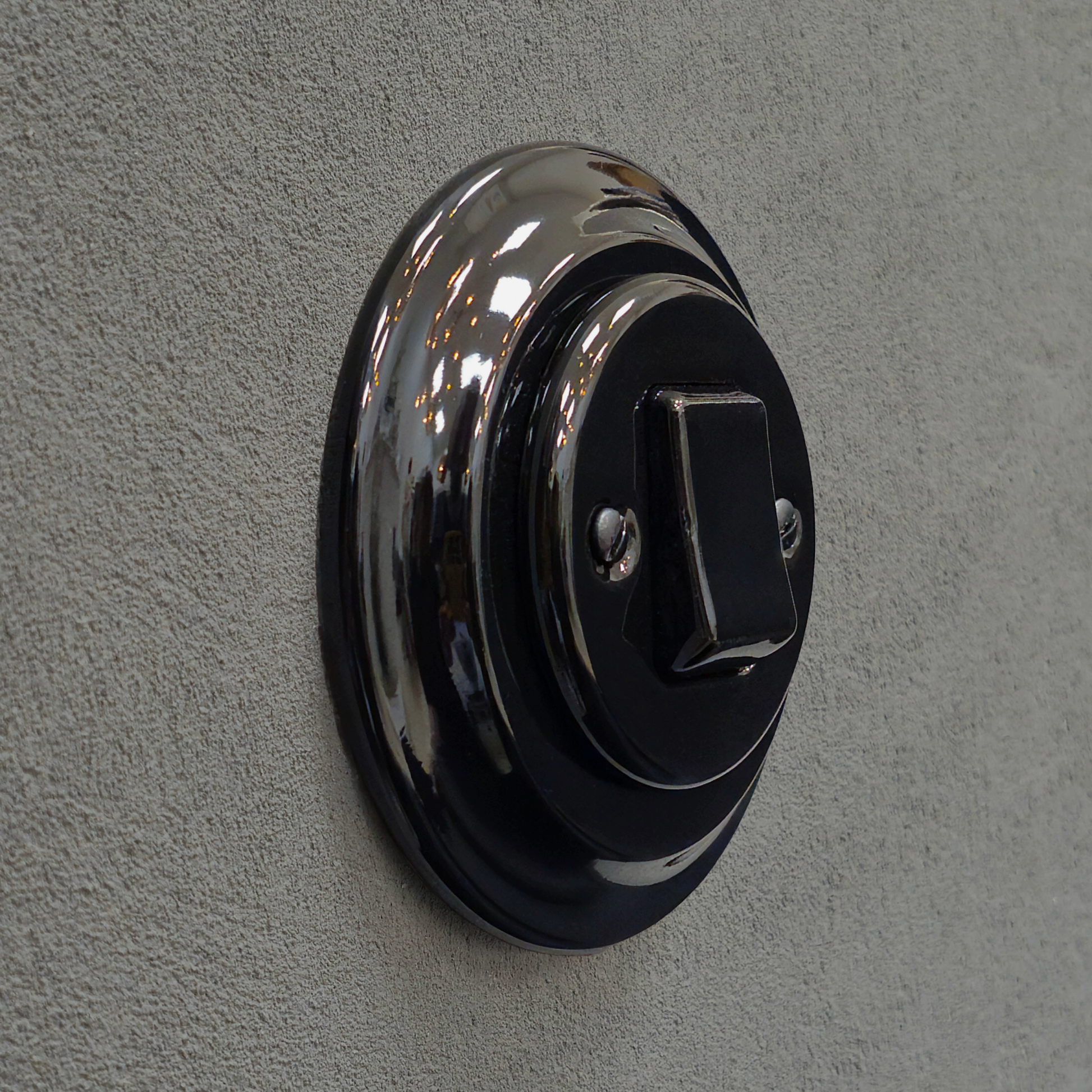 black porcelain intermediate big key light switch, flush-mount, angled