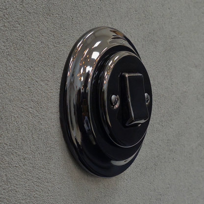 black porcelain intermediate big key light switch, flush-mount, angled