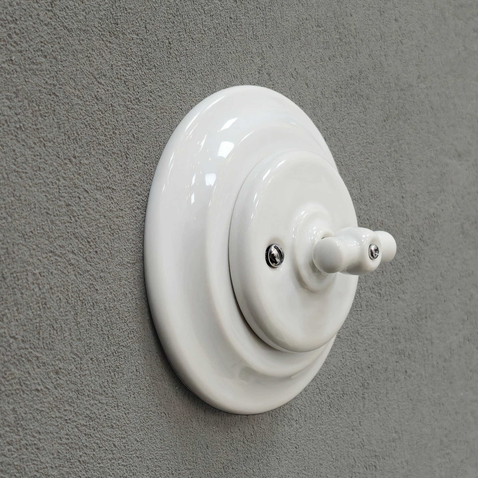 white porcelain 1gang2way rotary switch, flush-mount, angled