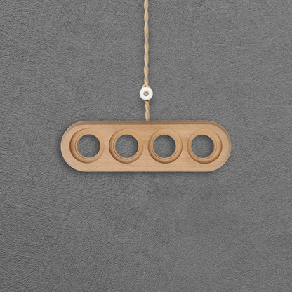 Surface Mount Socket and Switch Quadruple Frame in Light Brown
