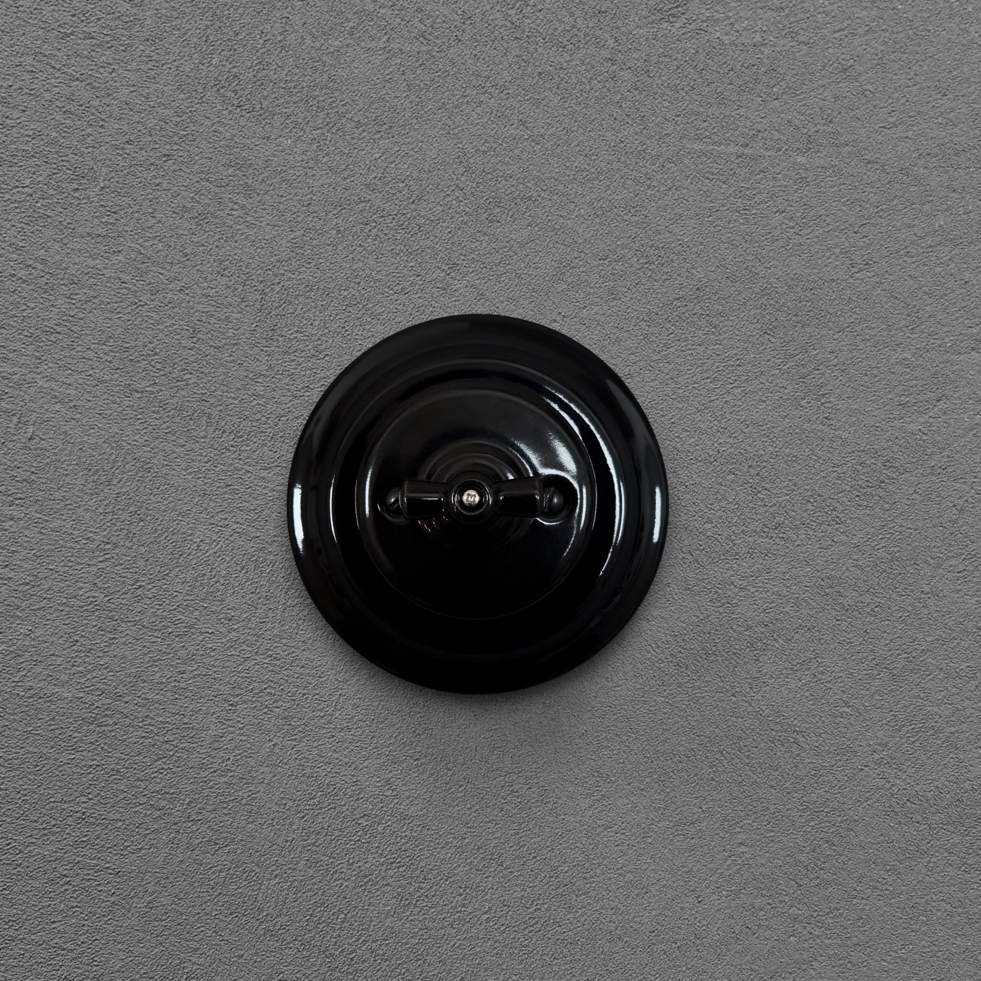black porcelain intermediate rotary light switch, flush-mount