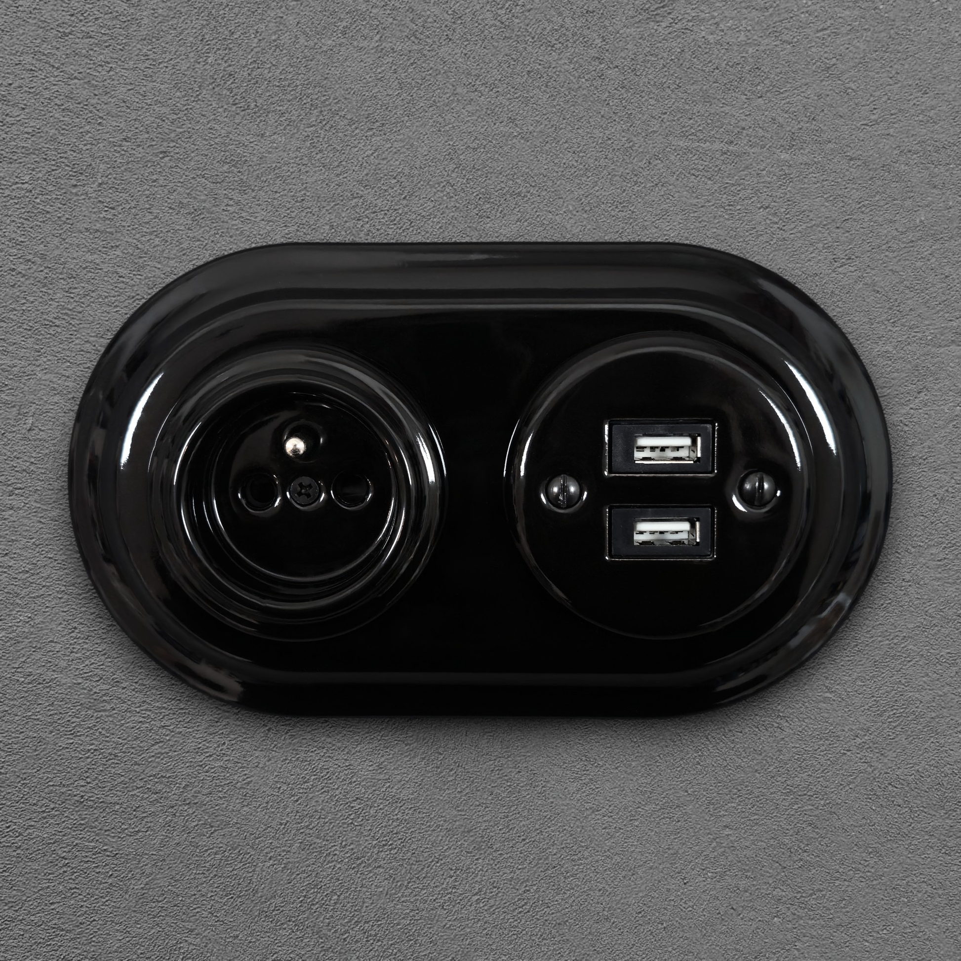 Black porcelain Type F socket with 2xUSB-A, flush-mount, front