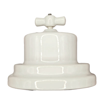 white porcelain intermediate rotary light switch, surface-mount, side