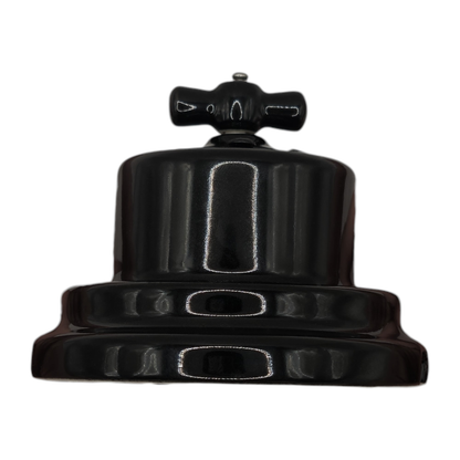 black porcelain 1gang2way rotary light switch, surface-mount, side