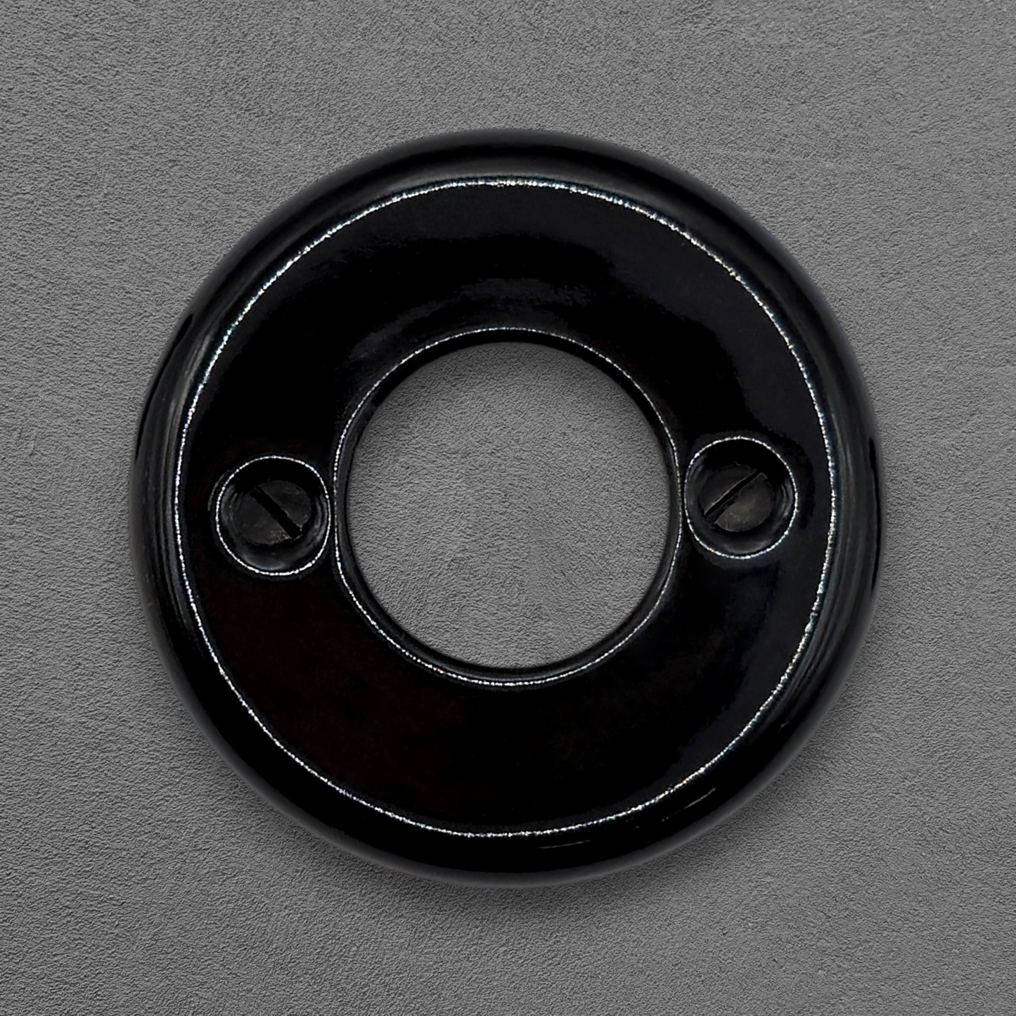 black porcelain dimmer switch cover, flush-mount, front