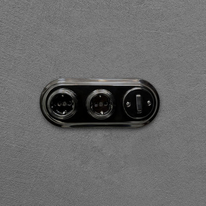 Double SCHUKO porcelain socket with light switch, black, flush-mounted