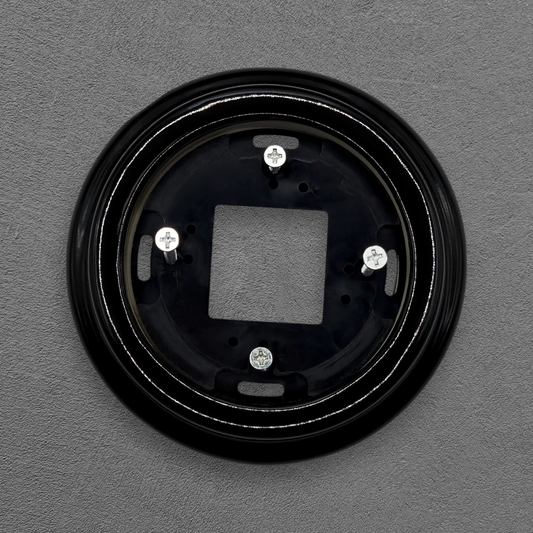 Surface Mount Socket and Switch Single Frame in Black Porcelain